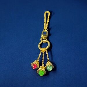 EFFY Jewelry Gold Tone Bell Bag Charm Keychain with Red Crystal Accent